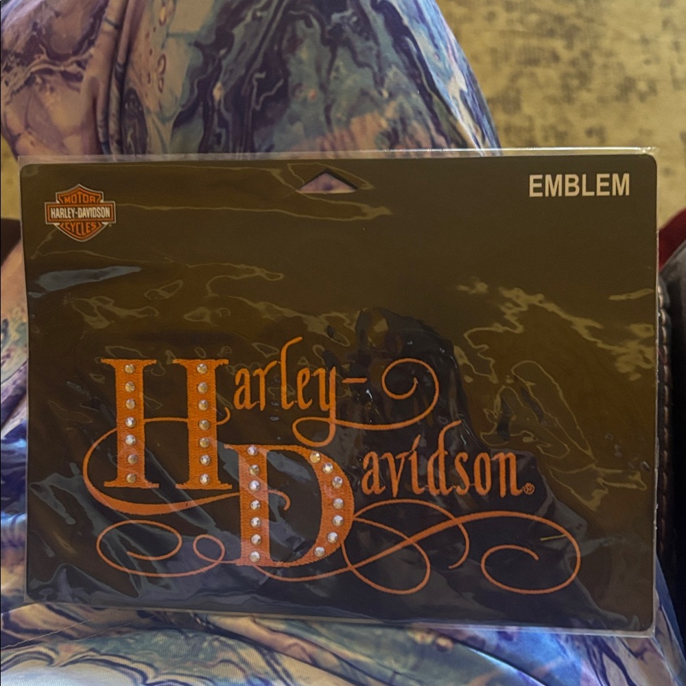 Harley-Davidson Logo with Orange and Black Accents Emblem